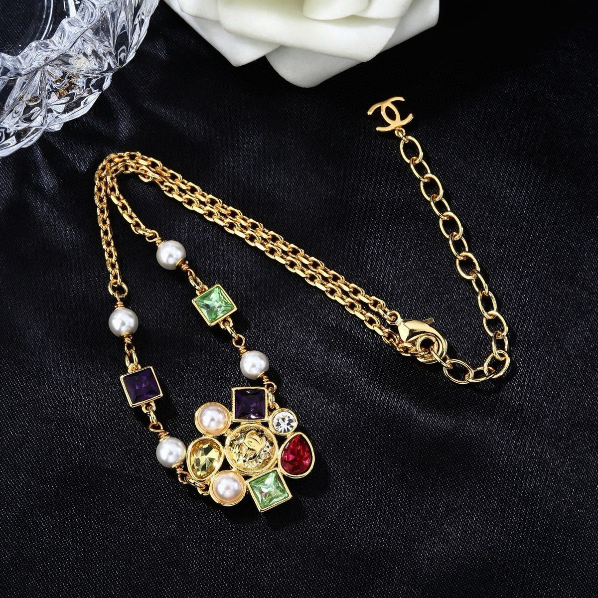 Martin Graham pendant necklace in polished metal-tone – side detail