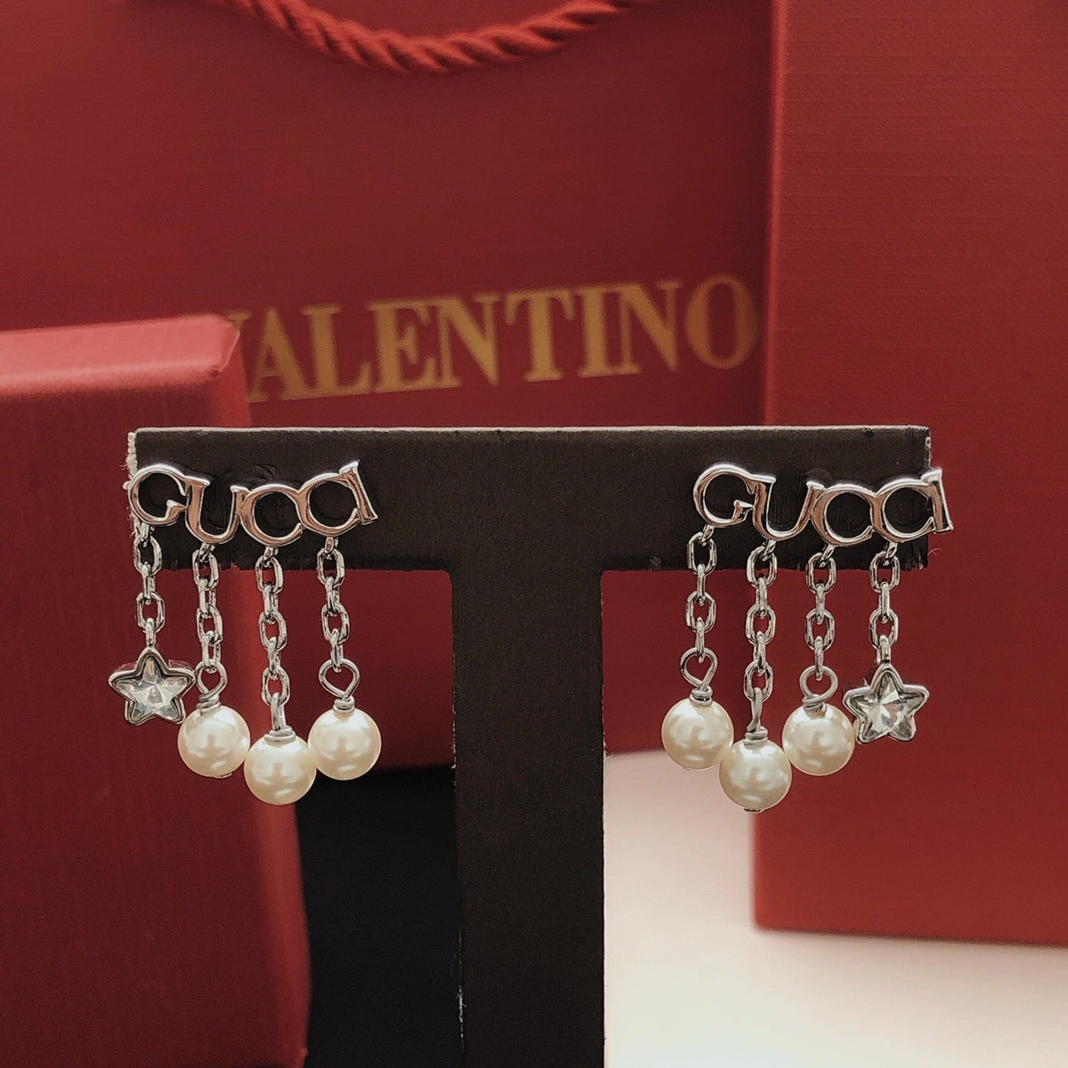 Martin Graham stud earrings in polished metal-tone – main product view