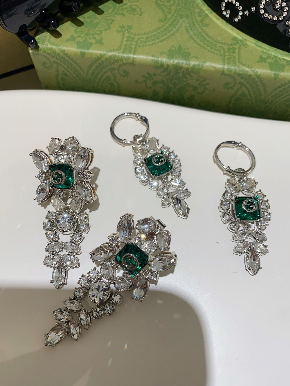 Martin Graham earrings in polished metal-tone – front product view