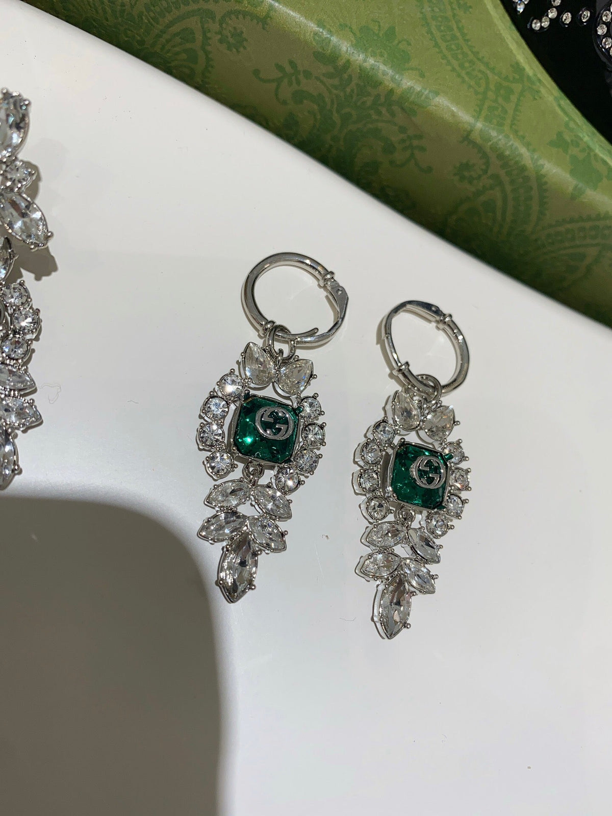 Martin Graham earrings in polished metal-tone – detail view