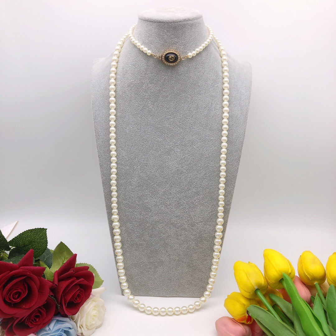 Martin Graham pendant necklace in polished metal-tone – front product view