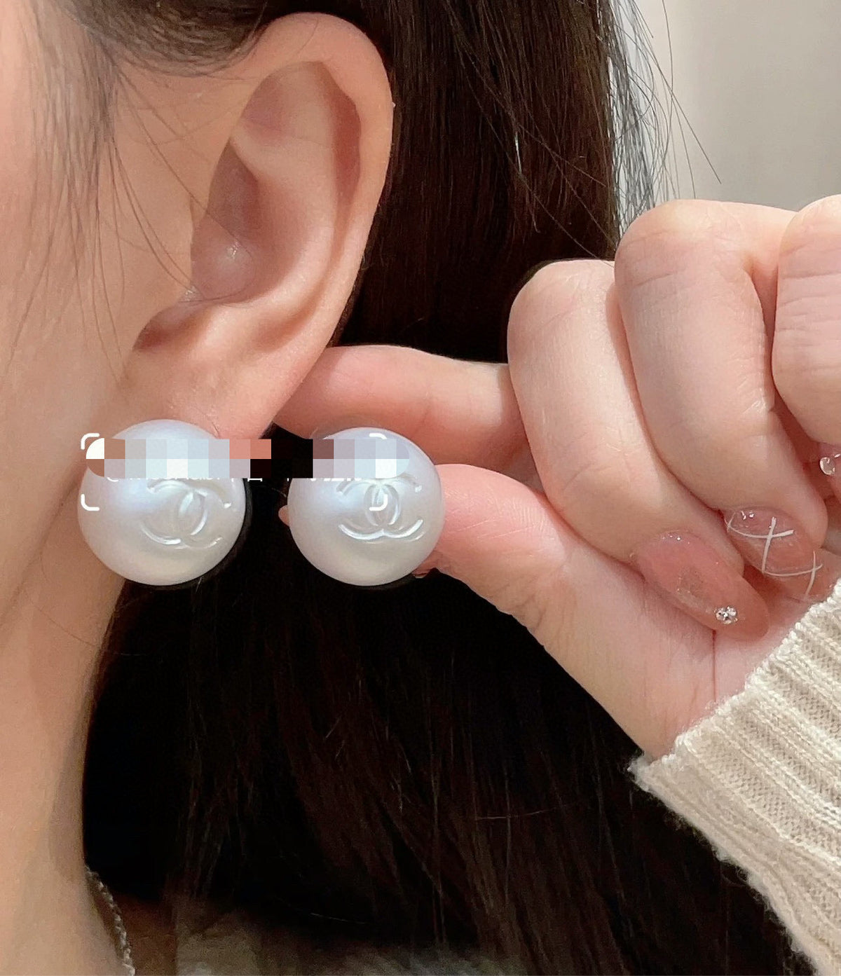 Martin Graham stud earrings in polished metal-tone – styled product view
