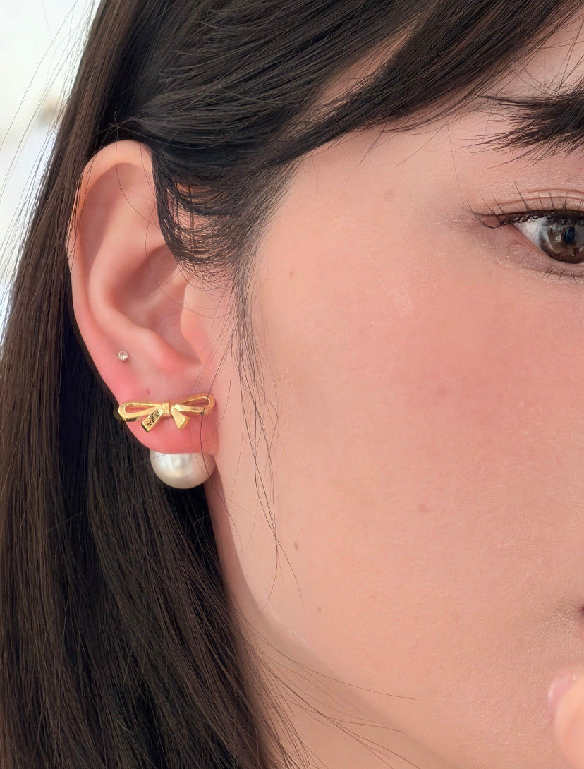 Martin Graham stud earrings in polished metal-tone – detail view