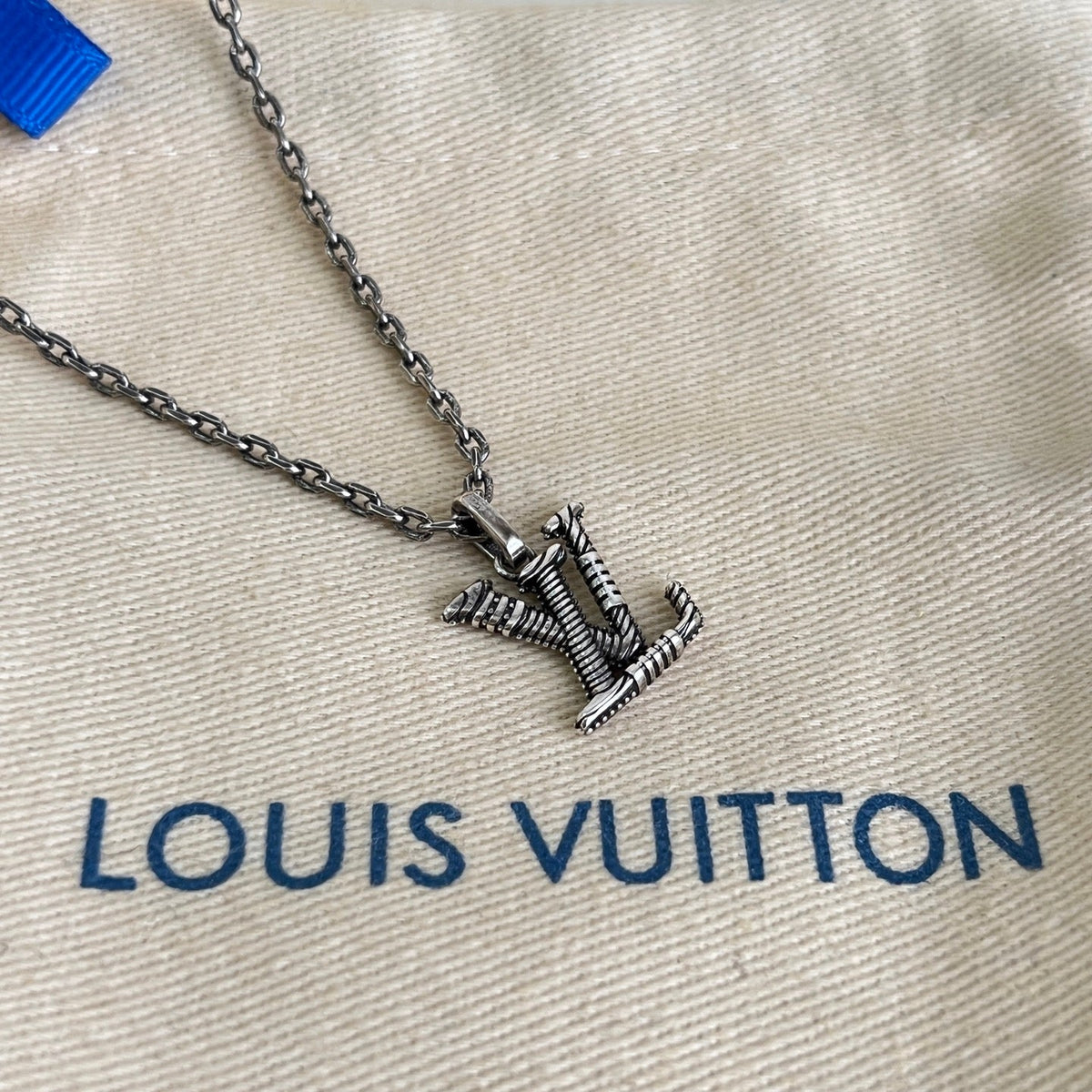 Martin Graham pendant necklace in polished metal-tone – styled product view