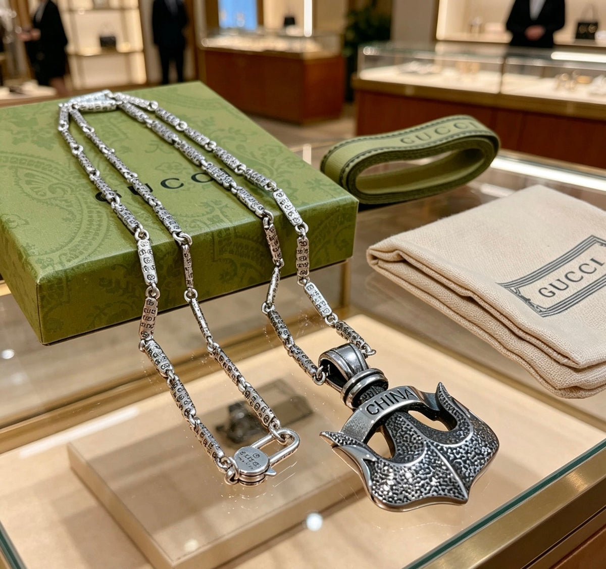 Martin Graham pendant necklace in polished metal-tone – front product view