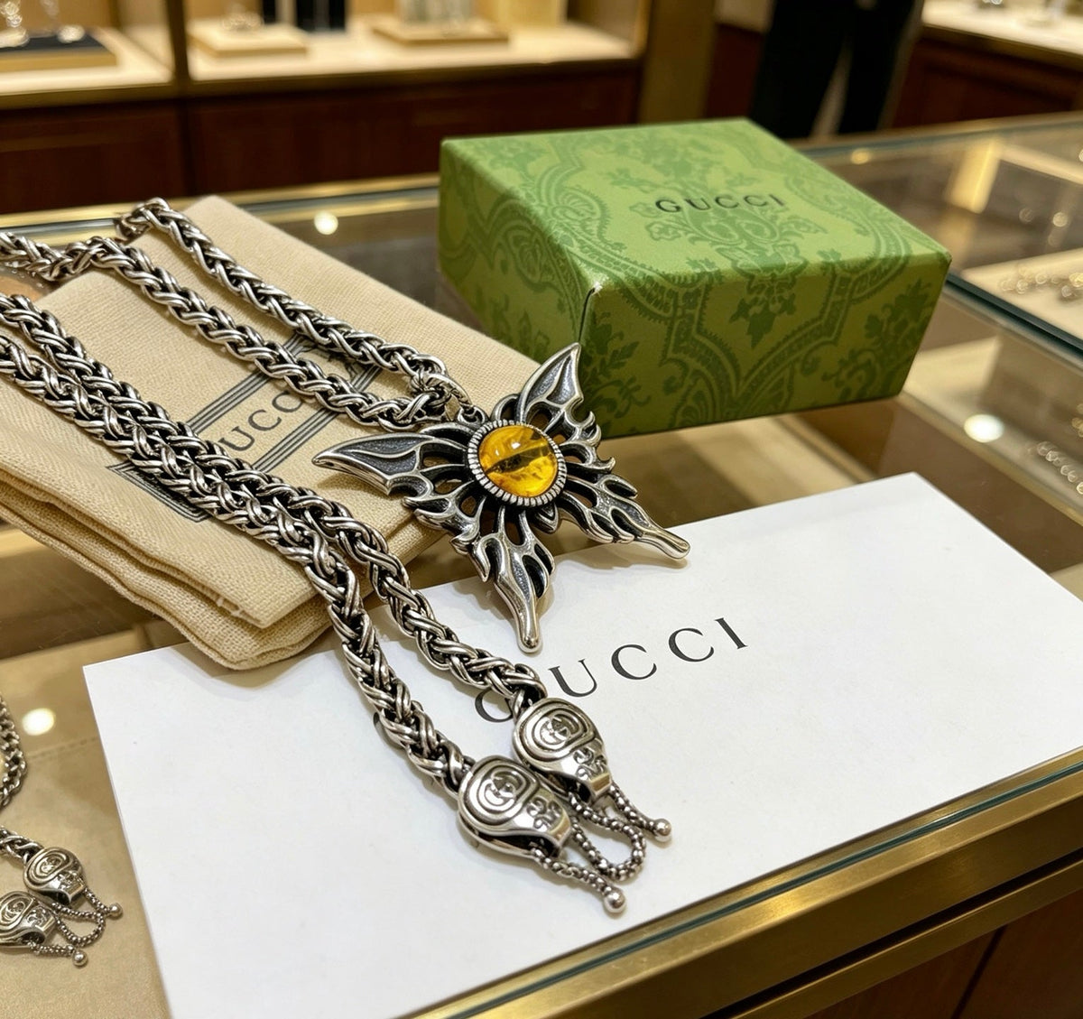 Martin Graham pendant necklace in polished metal-tone – detail view