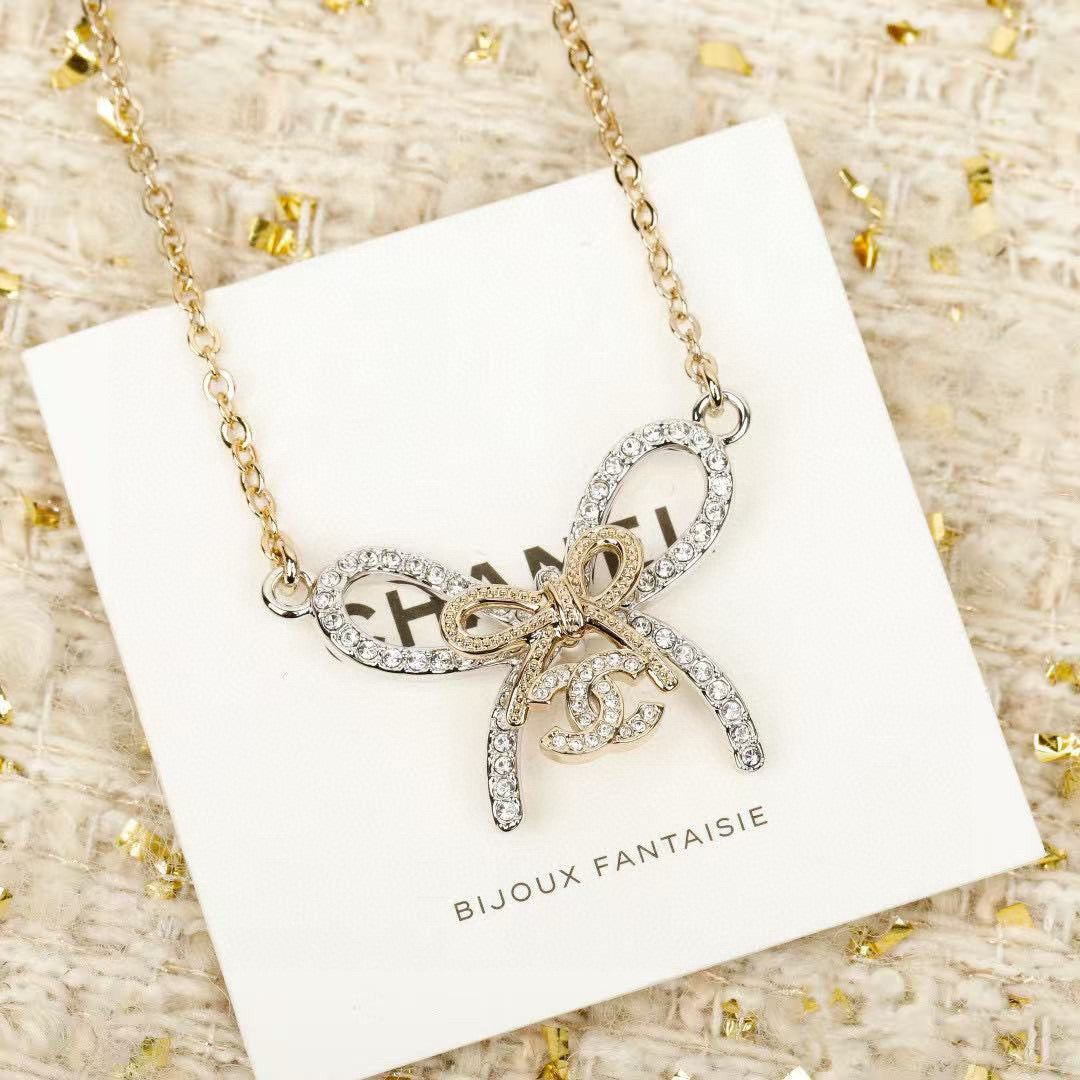 Martin Graham pendant necklace in polished metal-tone – styled product view