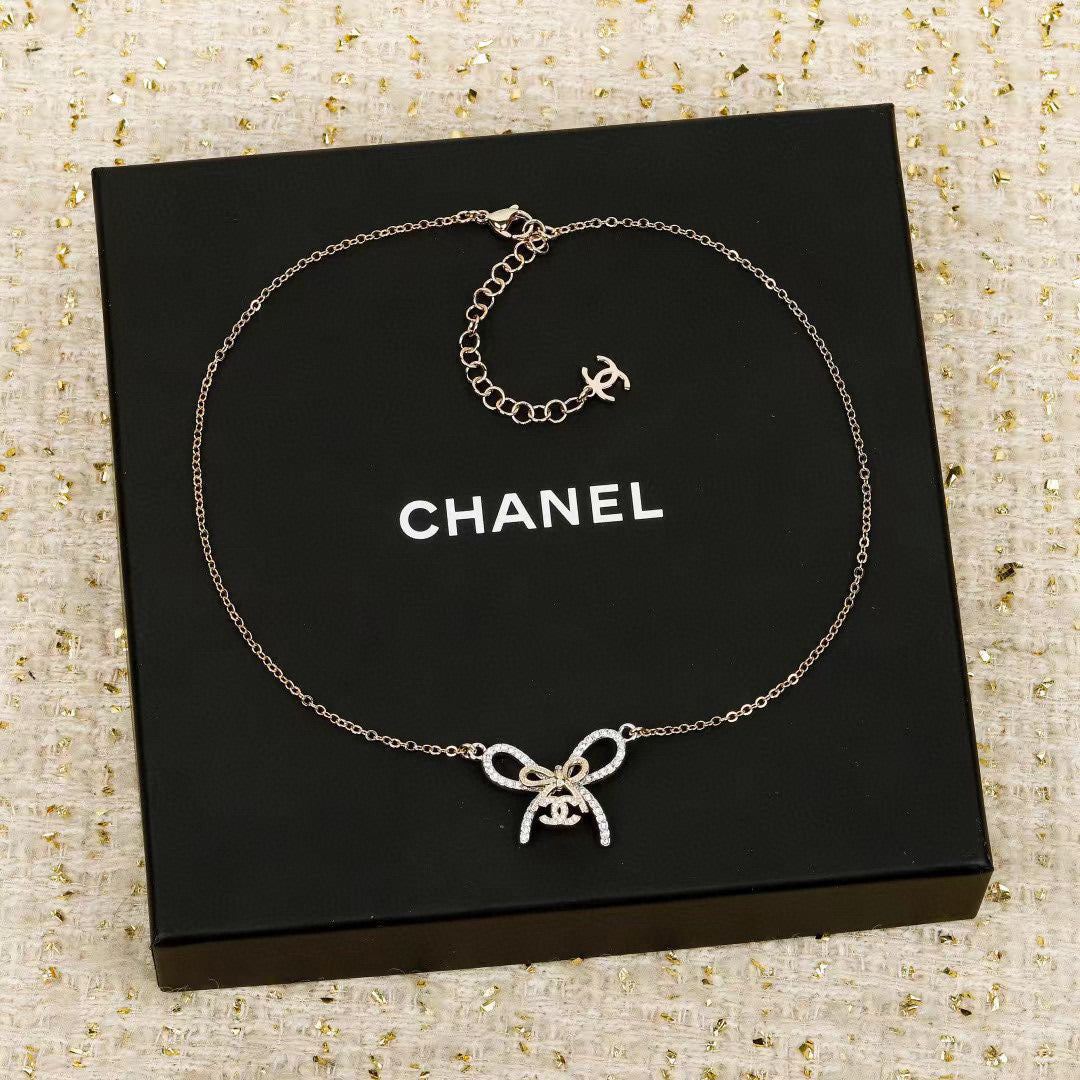 Martin Graham pendant necklace in polished metal-tone – front product view