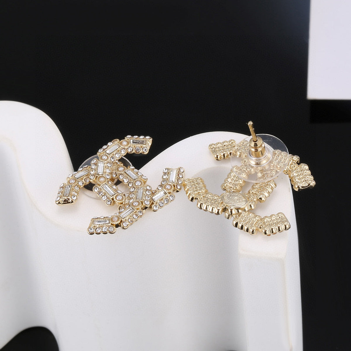 Martin Graham stud earrings in polished metal-tone – main product view