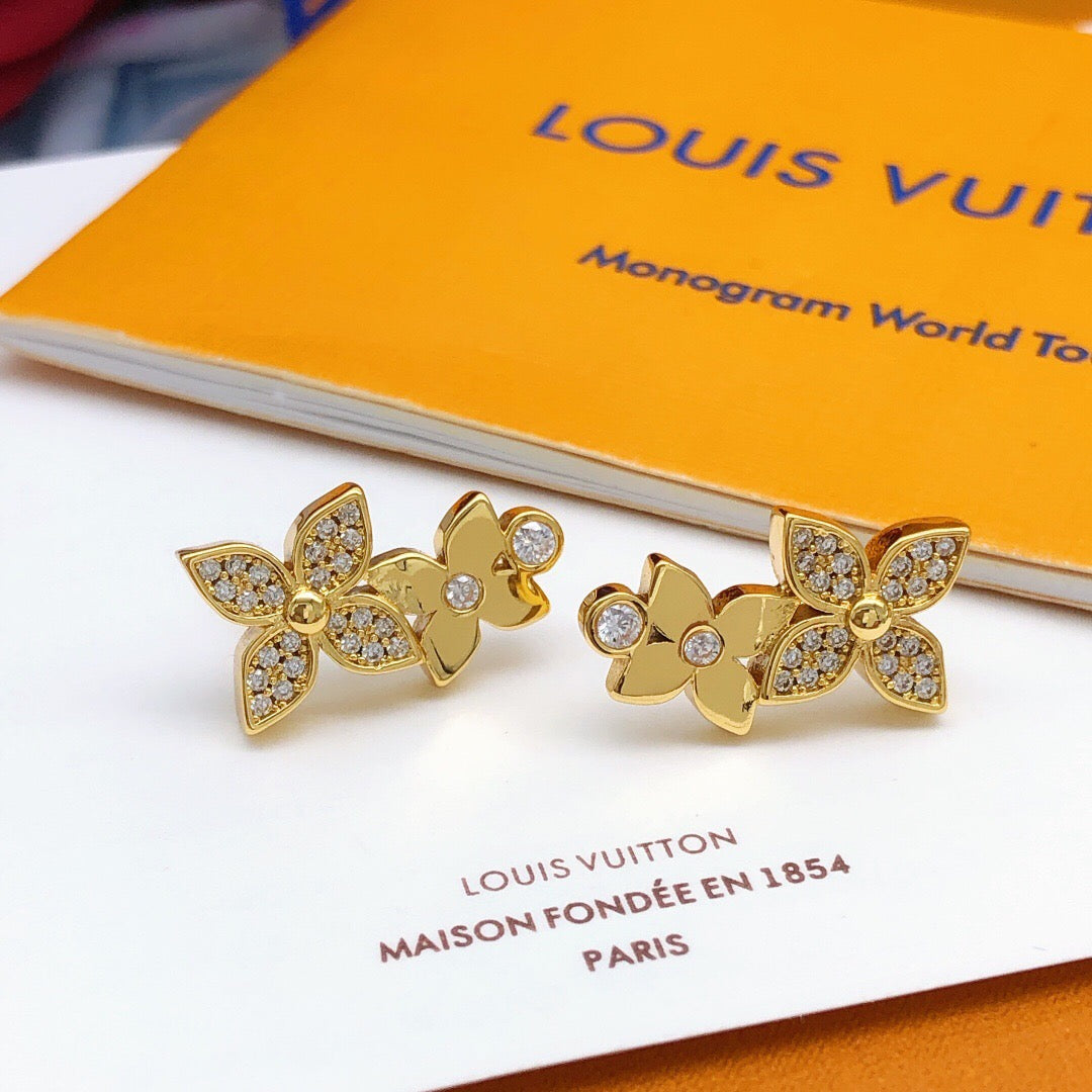 Martin Graham stud earrings in polished metal-tone – detail view