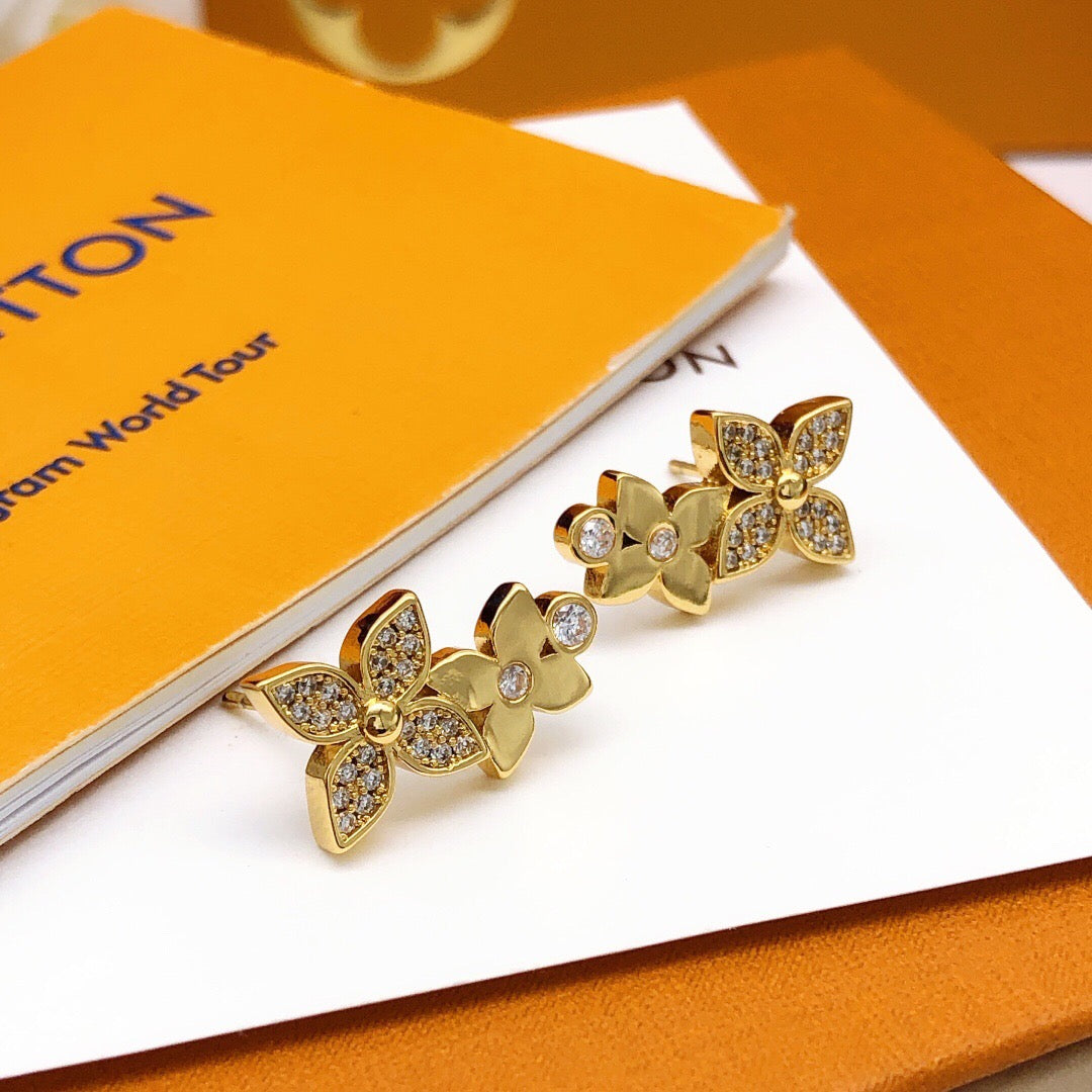 Martin Graham stud earrings in polished metal-tone – front product view