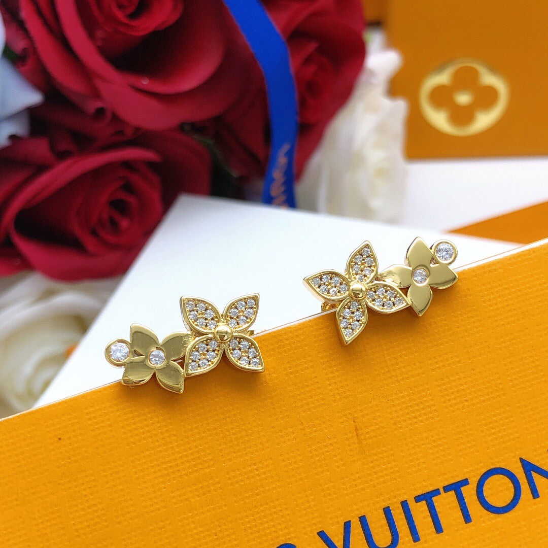 Martin Graham stud earrings in polished metal-tone – detail view