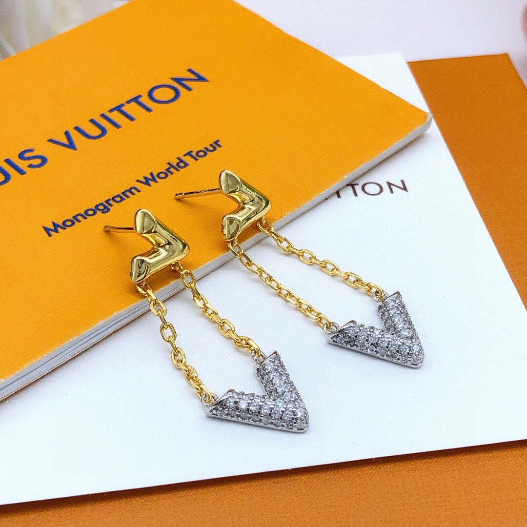 Martin Graham stud earrings in polished metal-tone – side detail