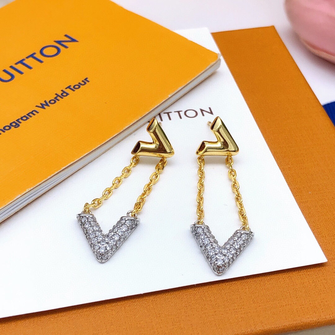 Martin Graham stud earrings in polished metal-tone – detail view