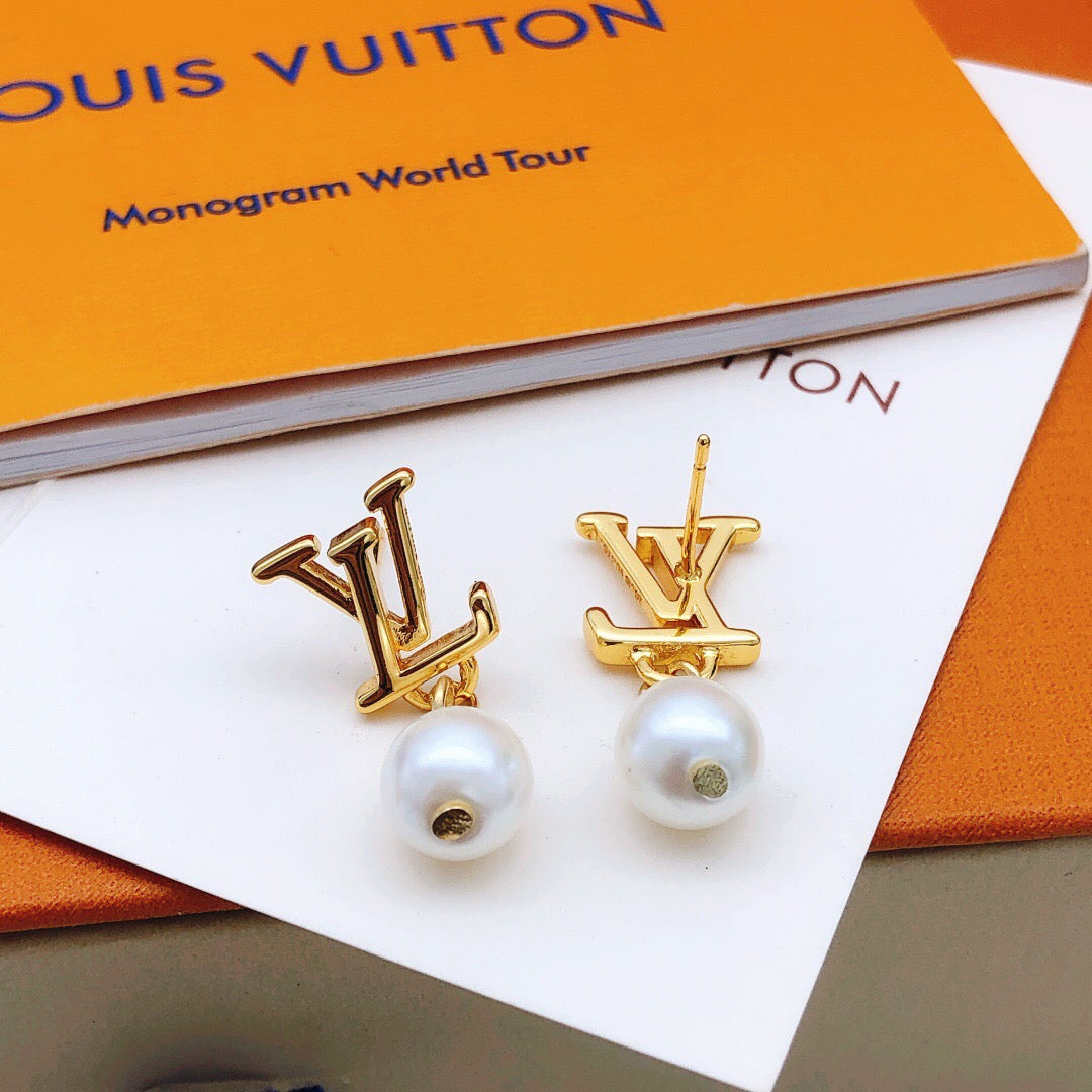 Martin Graham stud earrings in polished metal-tone – front product view