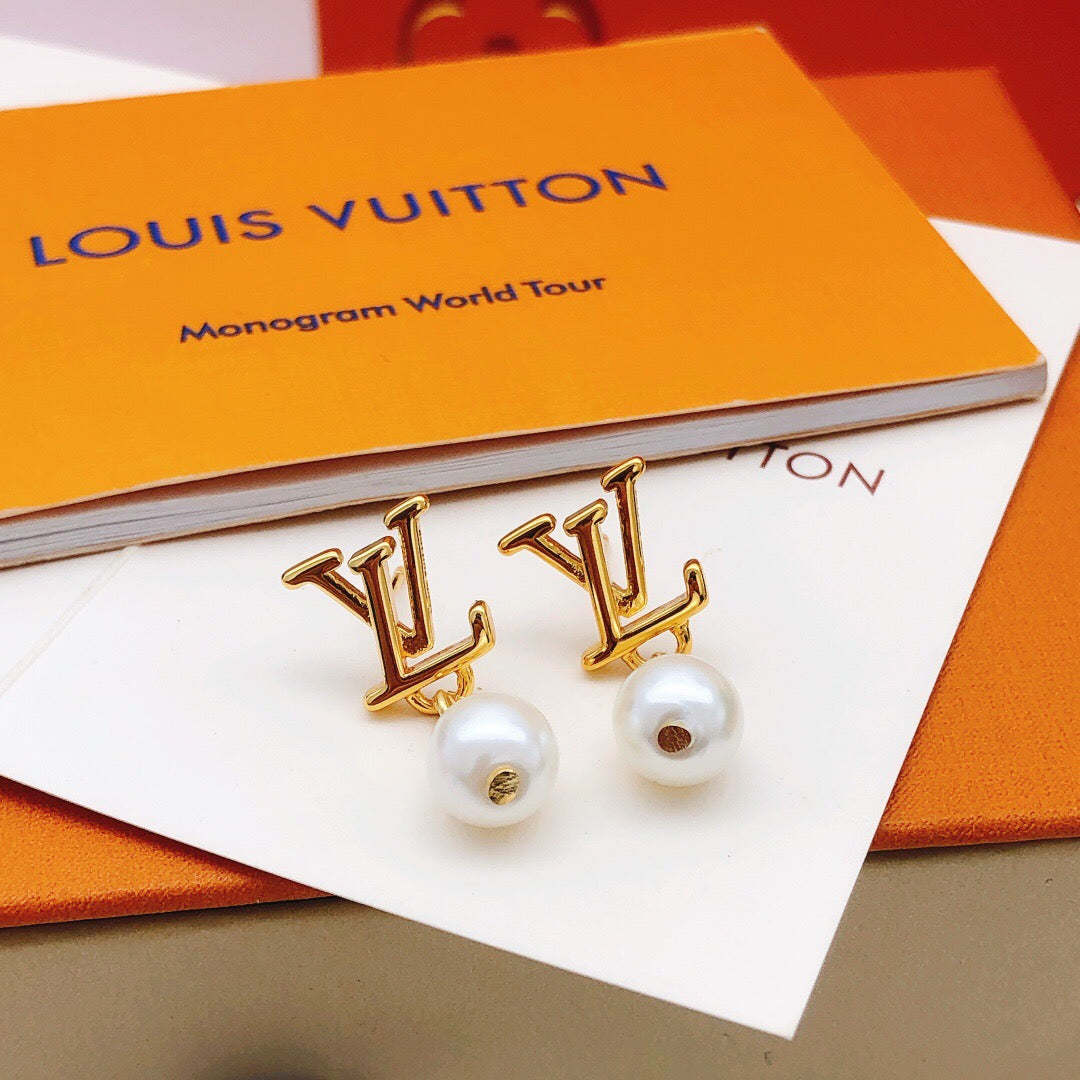 Martin Graham stud earrings in polished metal-tone – side detail