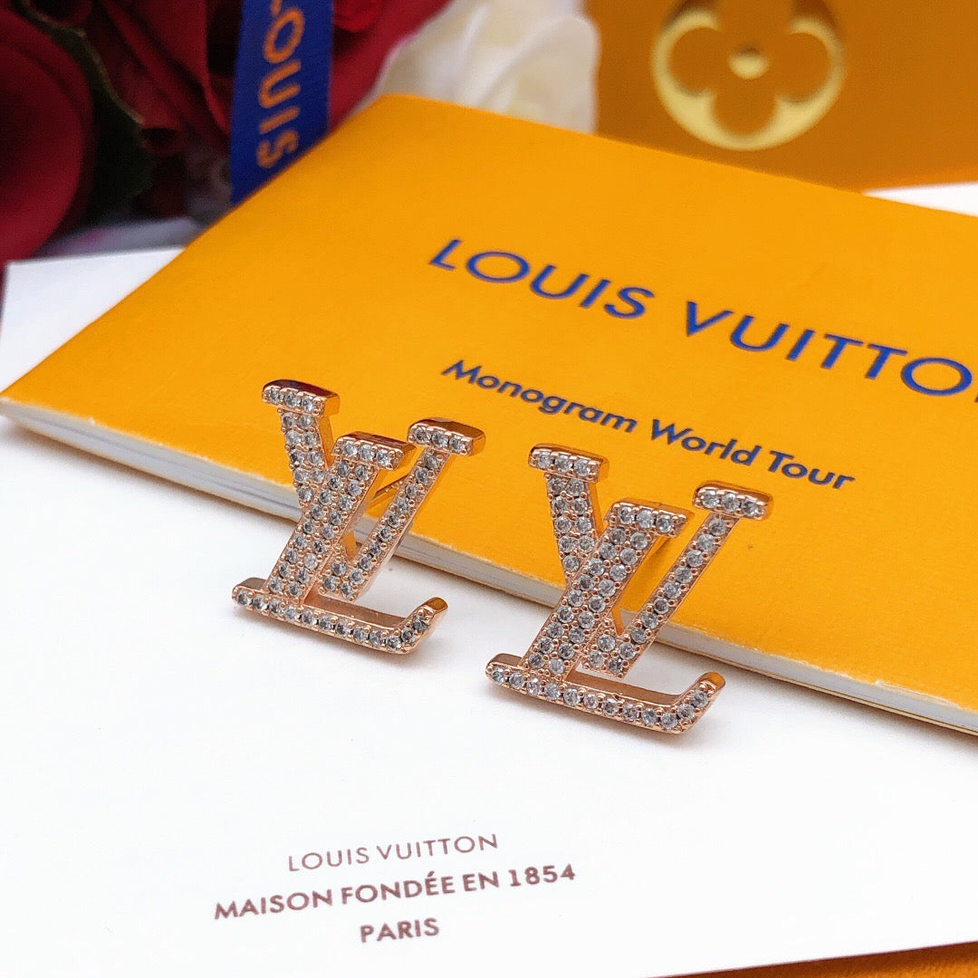 Martin Graham stud earrings in polished metal-tone – front product view