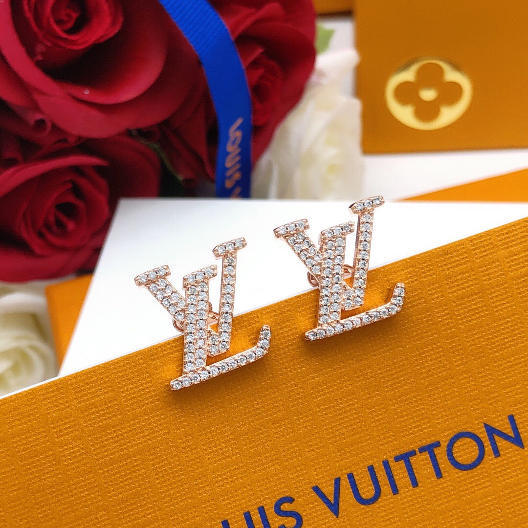 Martin Graham stud earrings in polished metal-tone – styled product view