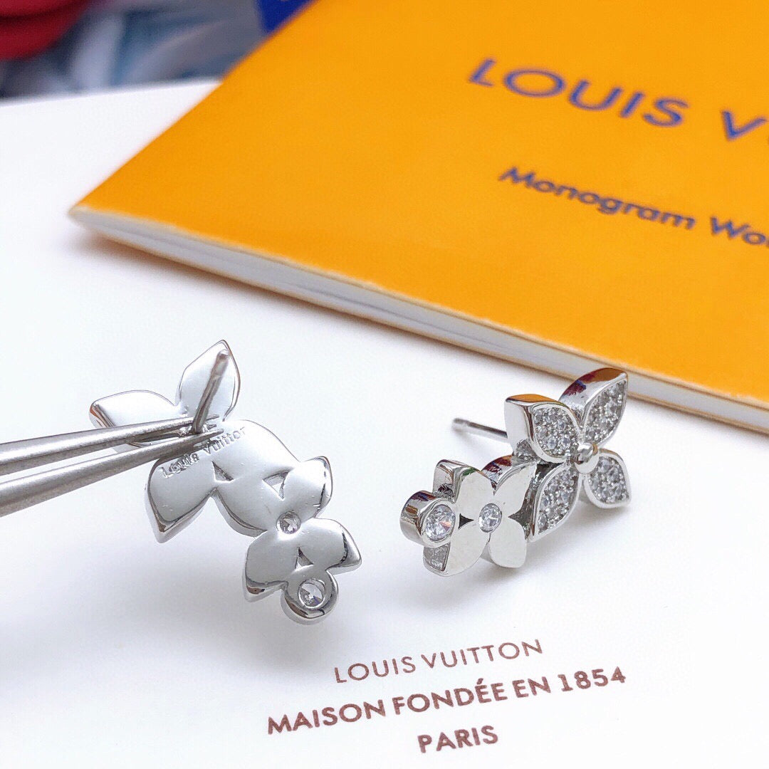 Martin Graham stud earrings in polished metal-tone – front product view