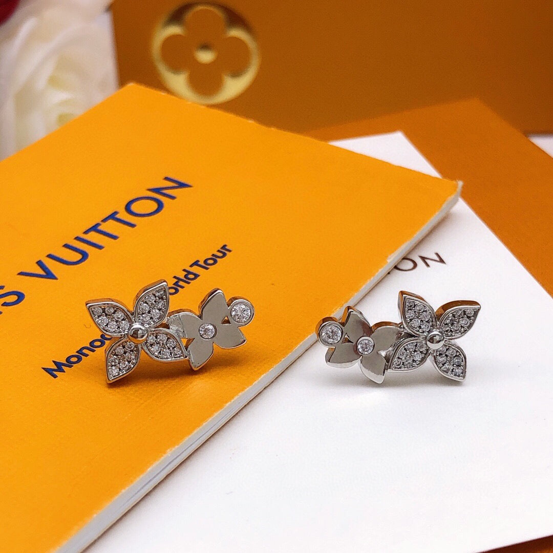 Martin Graham stud earrings in polished metal-tone – detail view