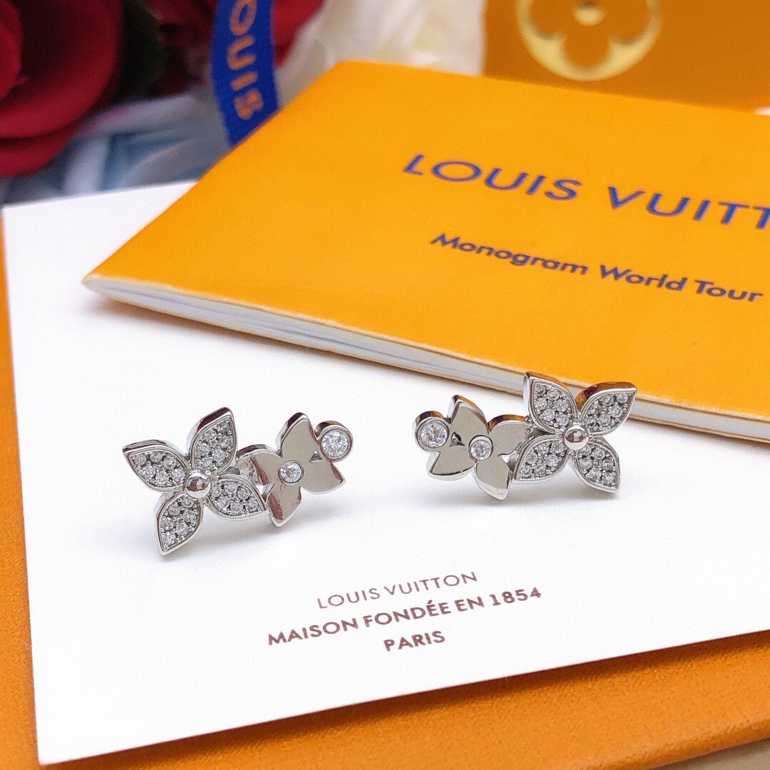 Martin Graham stud earrings in polished metal-tone – front product view