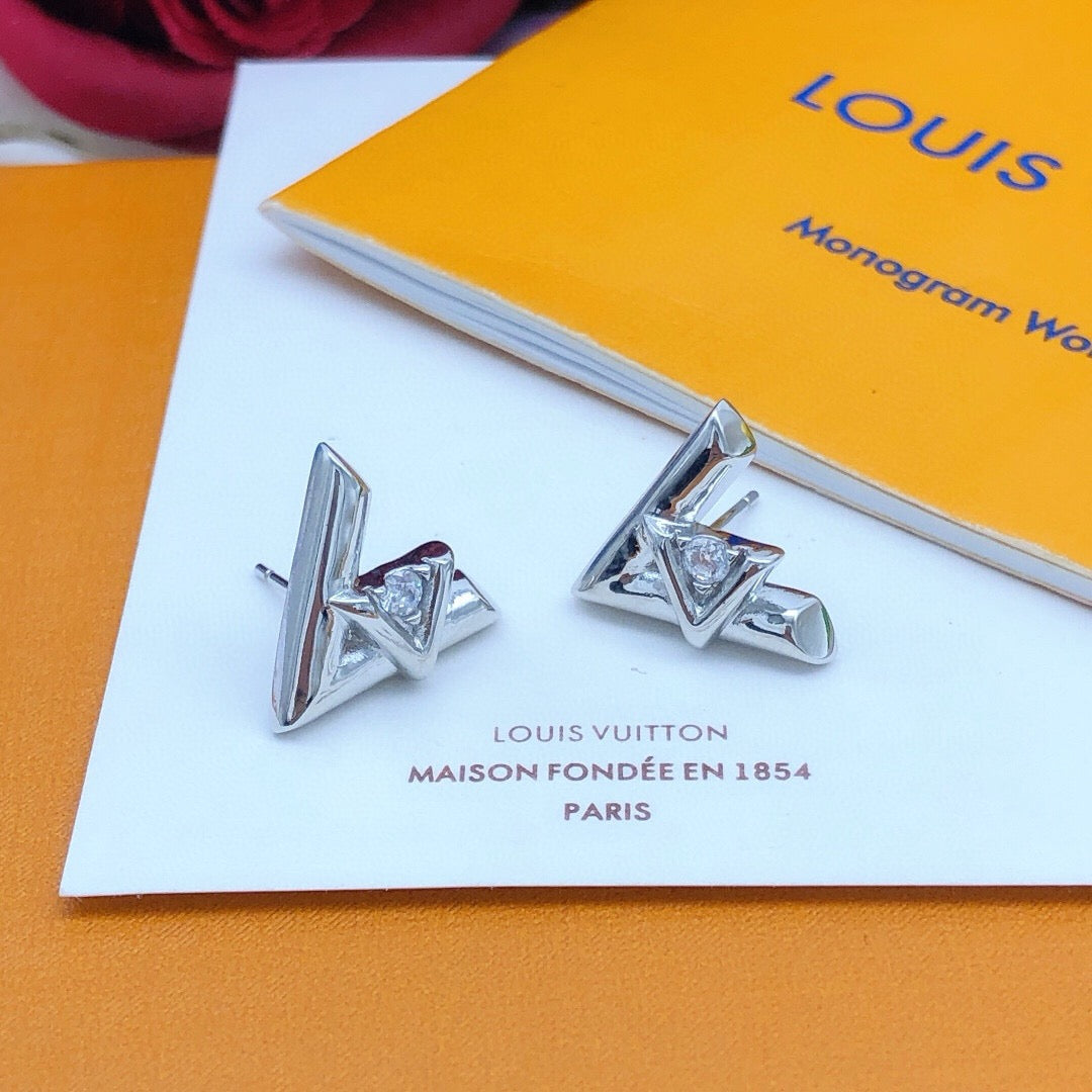 Martin Graham stud earrings in polished metal-tone – front product view