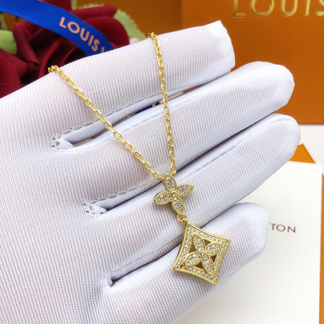 Martin Graham pendant necklace in polished metal-tone – close-up detail