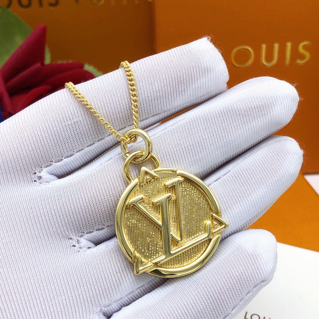 Martin Graham pendant necklace in polished metal-tone – side detail