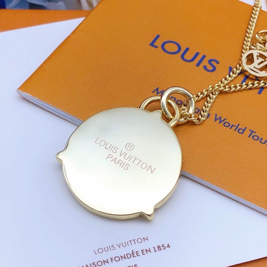 Martin Graham pendant necklace in polished metal-tone – close-up detail