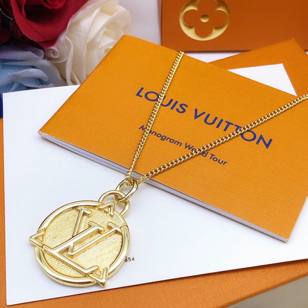 Martin Graham pendant necklace in polished metal-tone – detail view