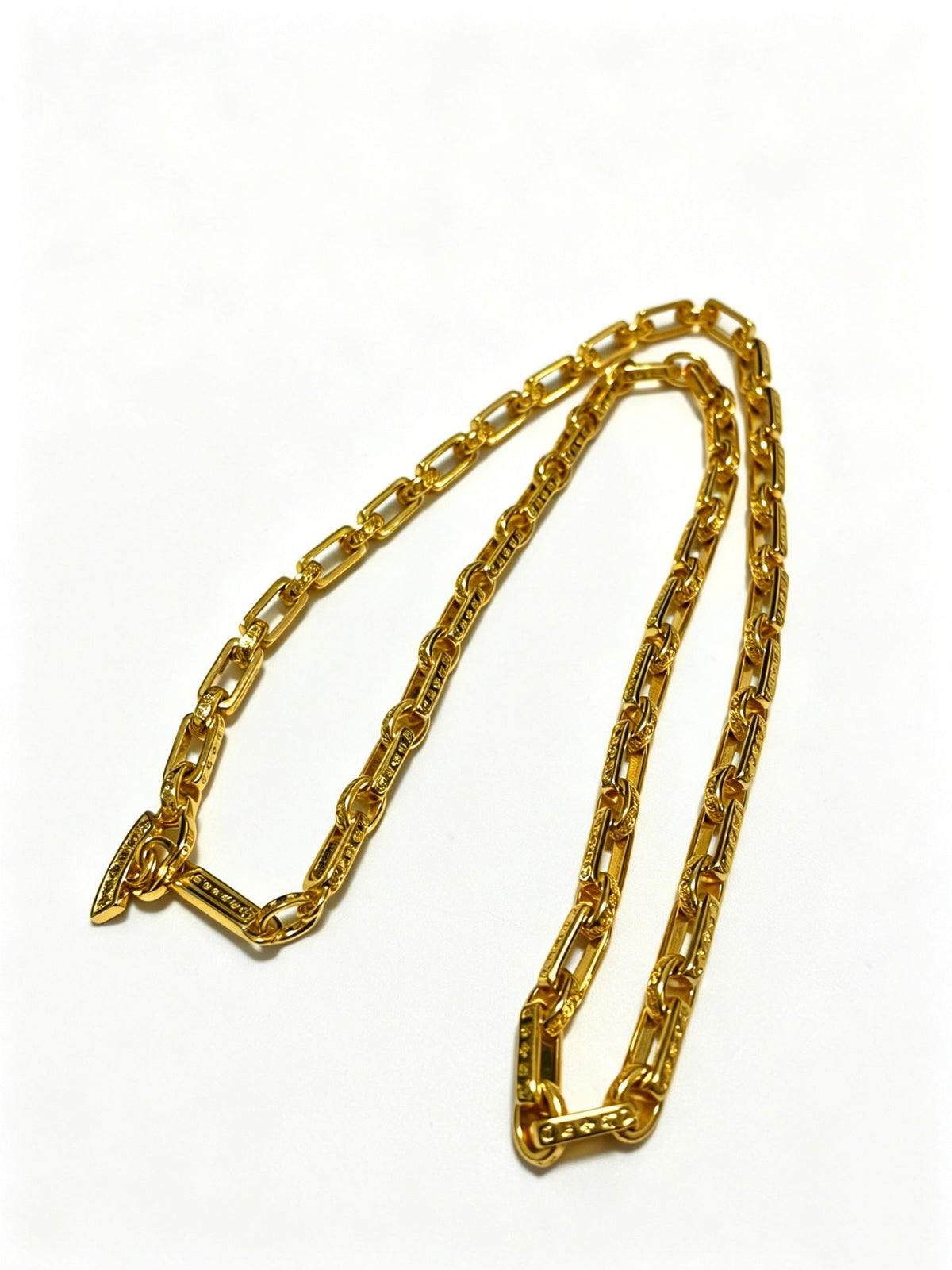 Martin Graham pendant necklace in polished metal-tone – detail view