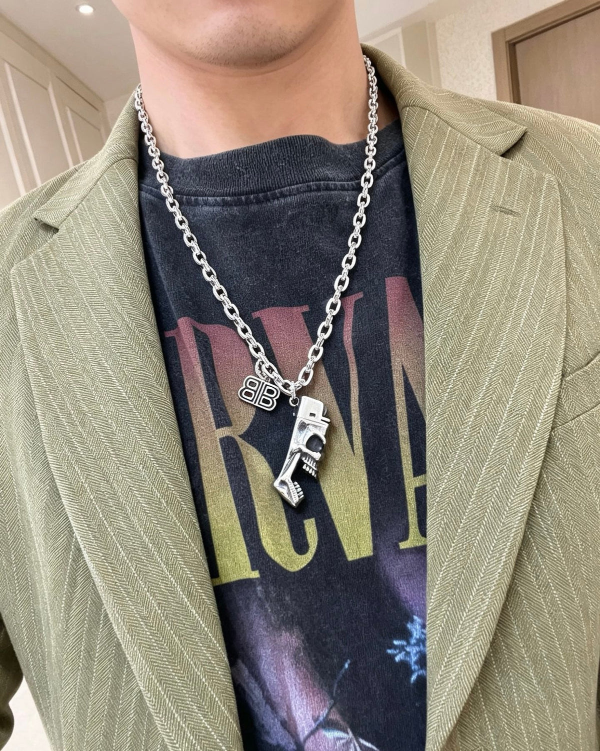 Martin Graham pendant necklace in polished metal-tone – detail view