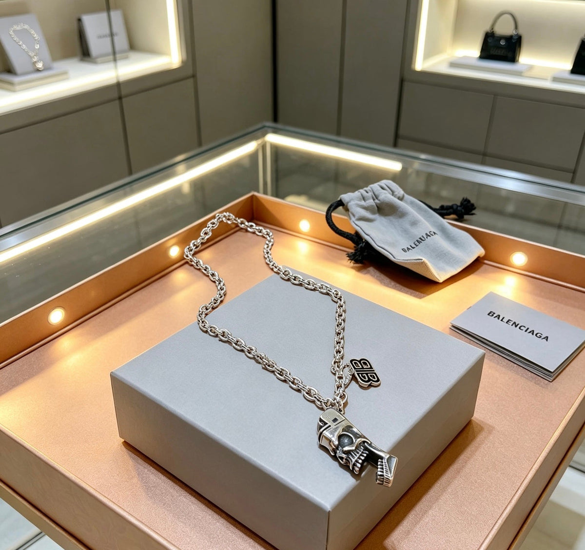 Martin Graham pendant necklace in polished metal-tone – close-up detail
