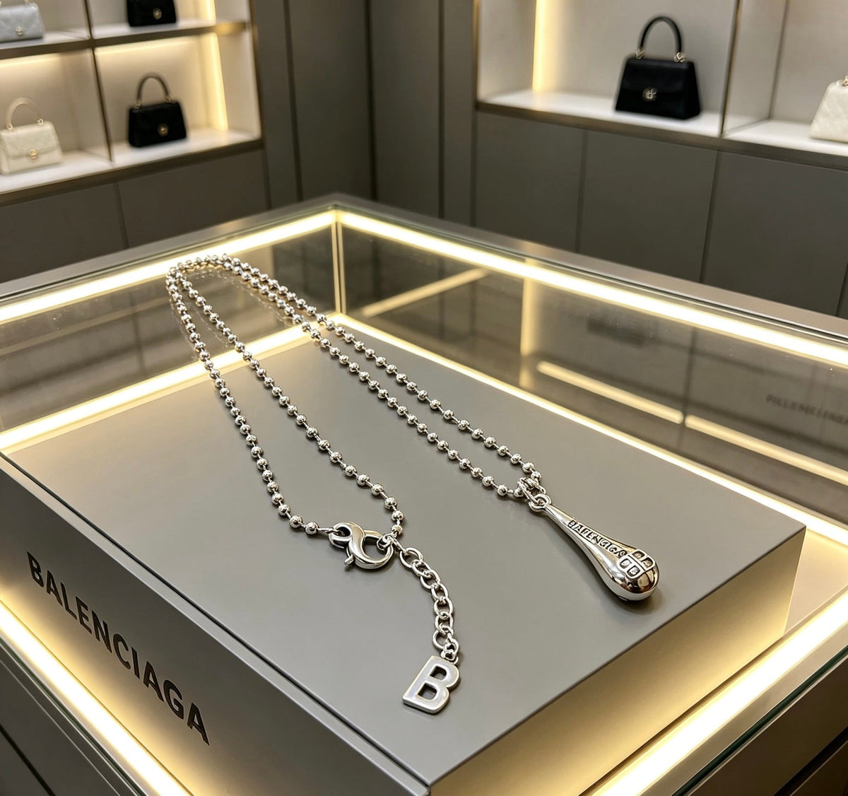 Martin Graham pendant necklace in polished metal-tone – main product view