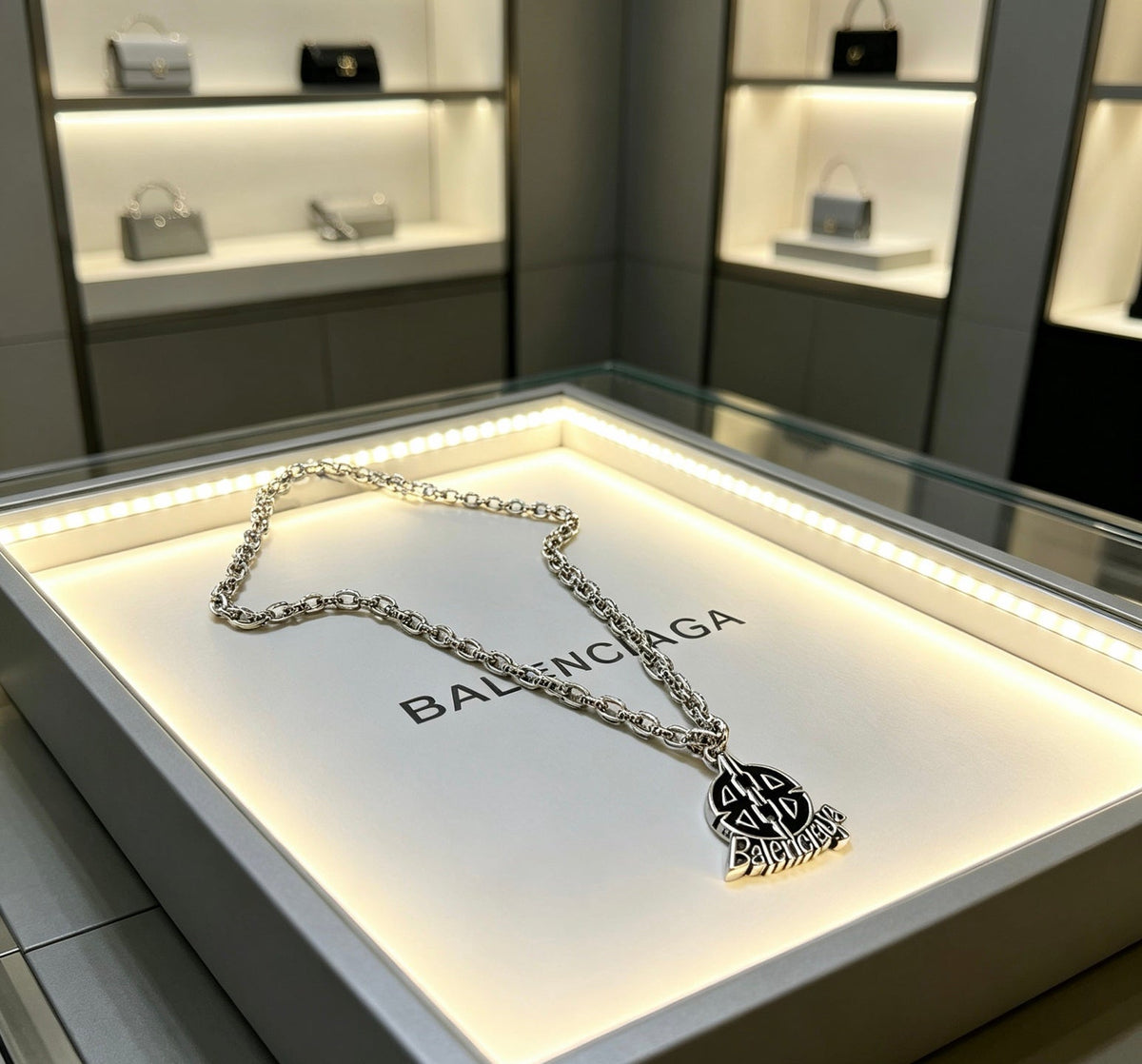 Martin Graham pendant necklace in polished metal-tone – front product view