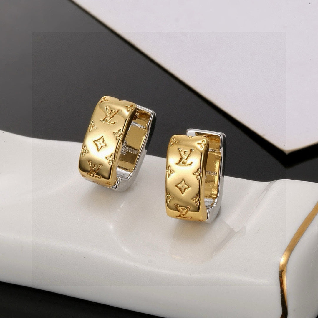 Martin Graham stud earrings in polished metal-tone – front product view