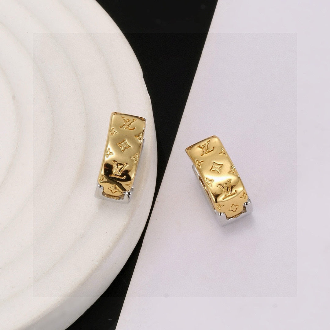 Martin Graham stud earrings in polished metal-tone – main product view