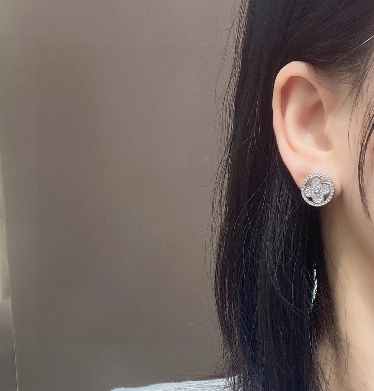 Martin Graham stud earrings in polished metal-tone – front product view