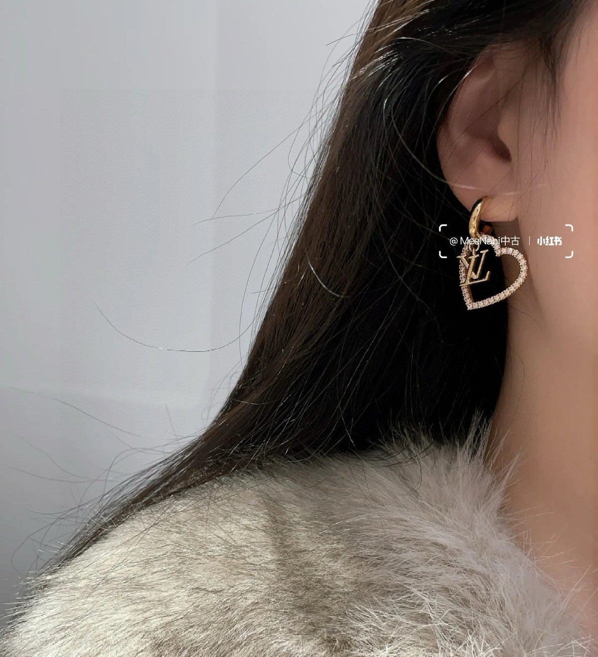 Martin Graham stud earrings in polished metal-tone – styled product view