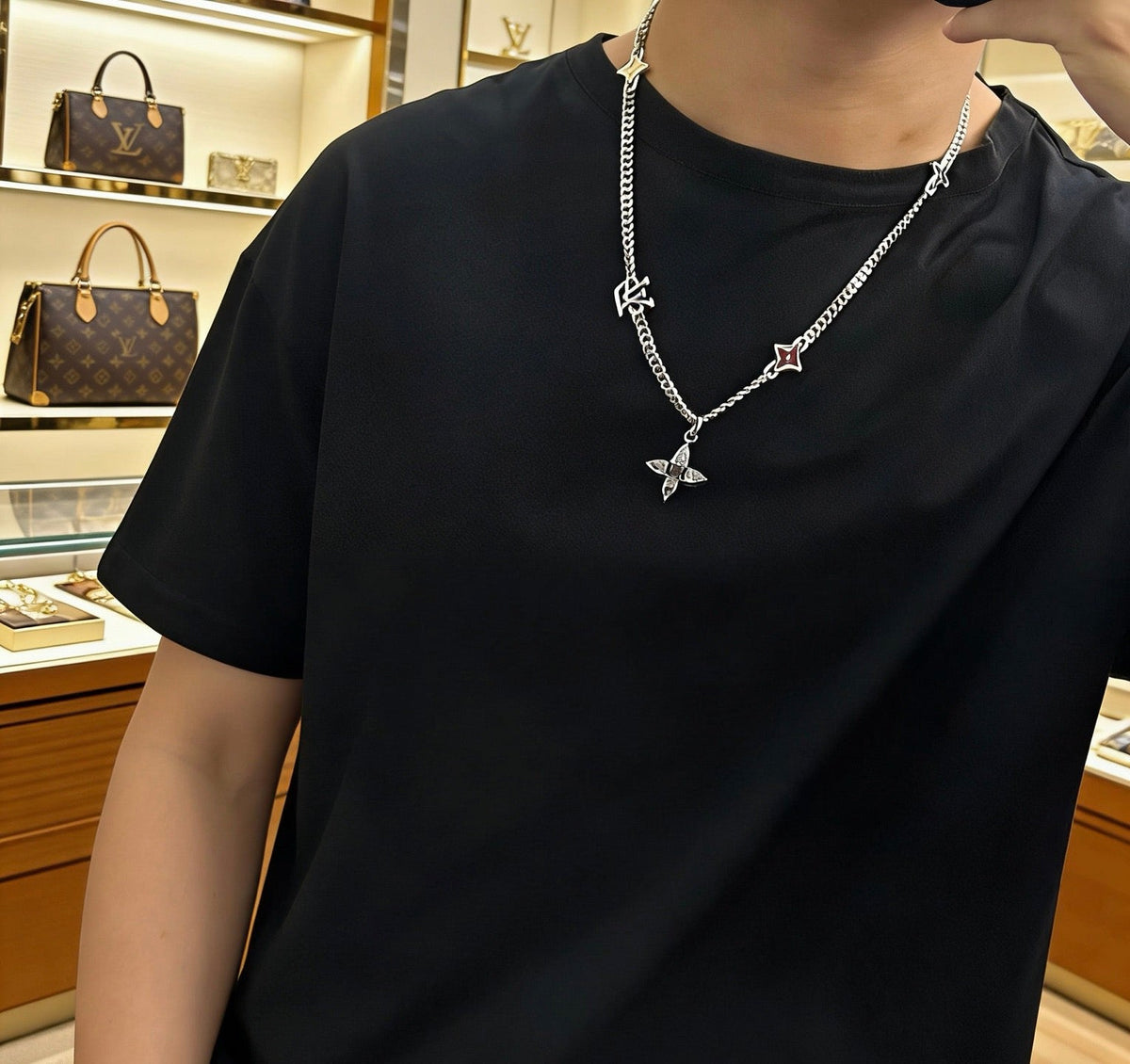 Martin Graham pendant necklace in polished metal-tone – side detail