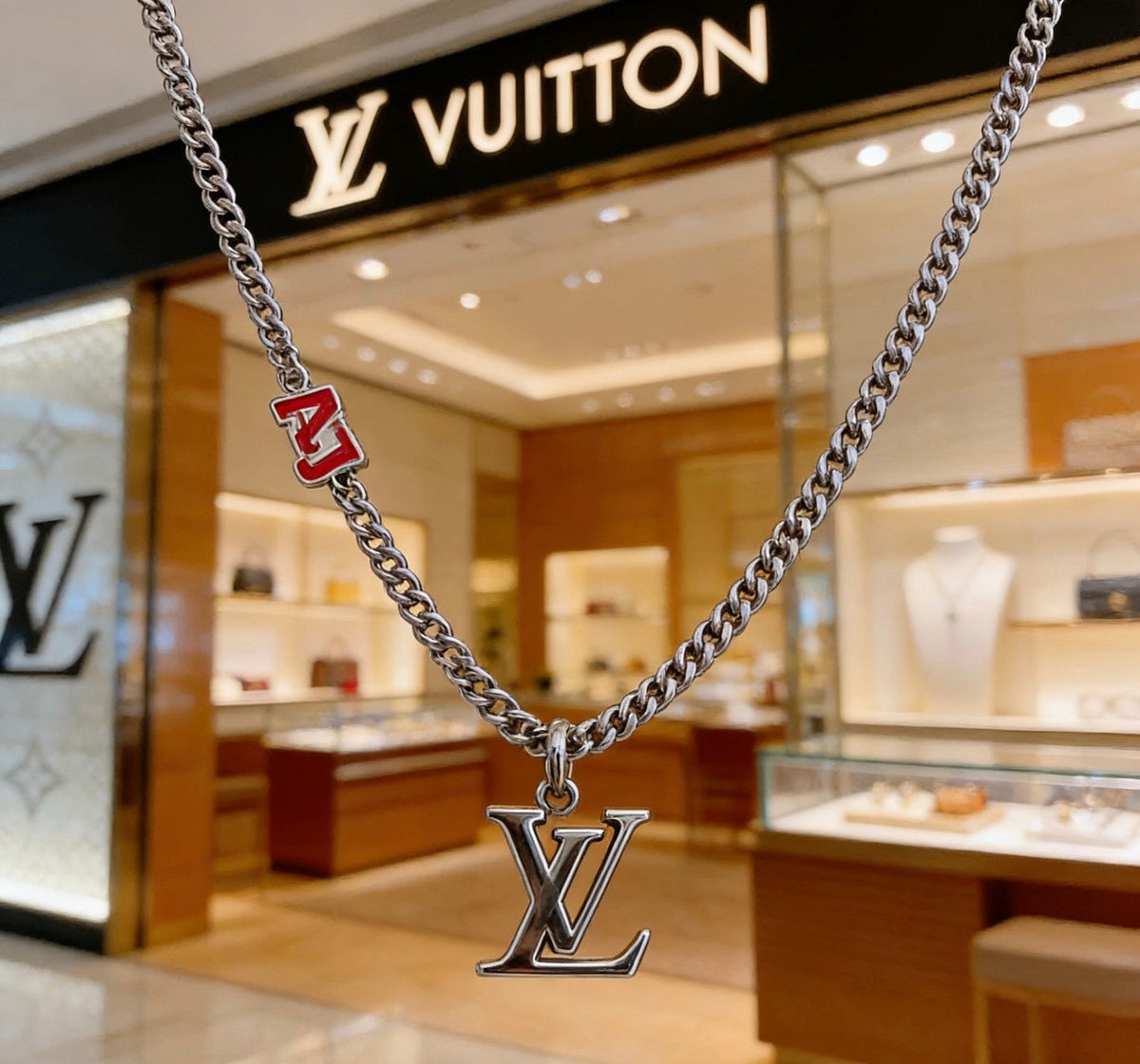 Martin Graham pendant necklace in polished metal-tone – front product view
