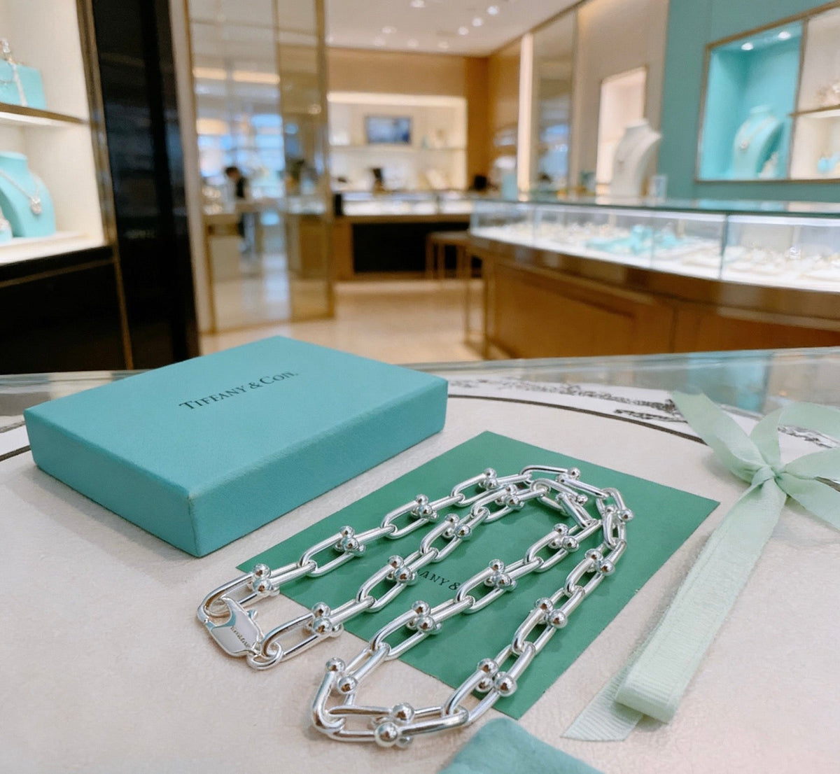 Martin Graham pendant necklace in polished metal-tone – styled product view