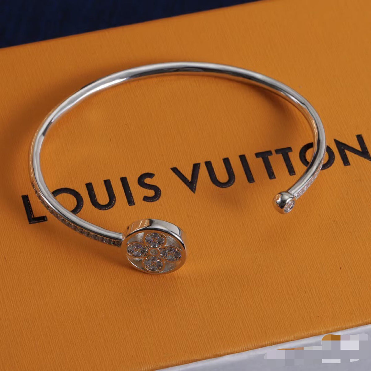 Martin Graham bangle in polished metal-tone – close-up detail