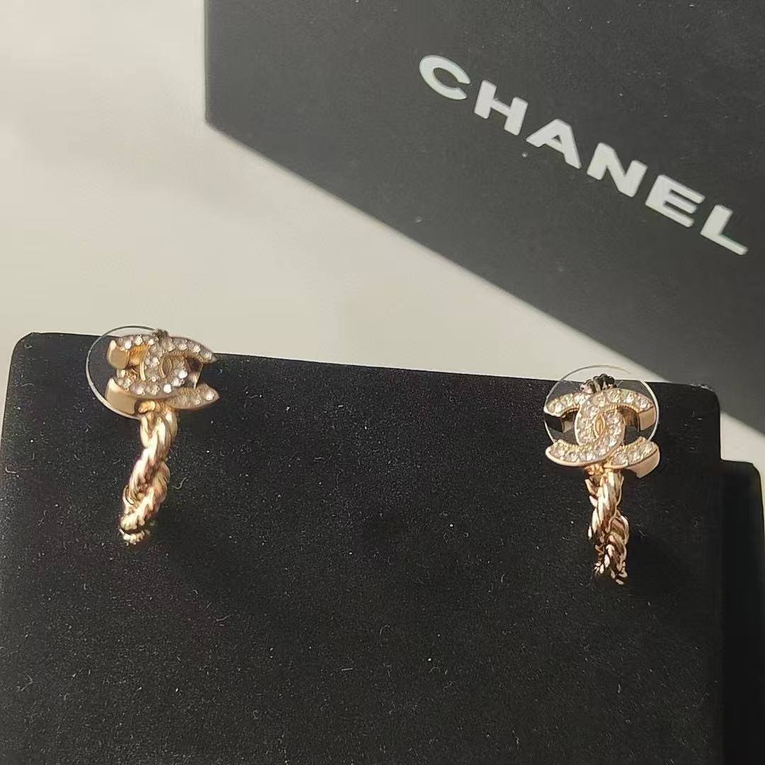 Martin Graham stud earrings in polished metal-tone – front product view