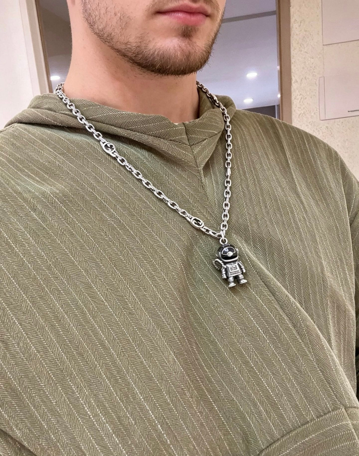 Martin Graham pendant necklace in polished metal-tone – detail view