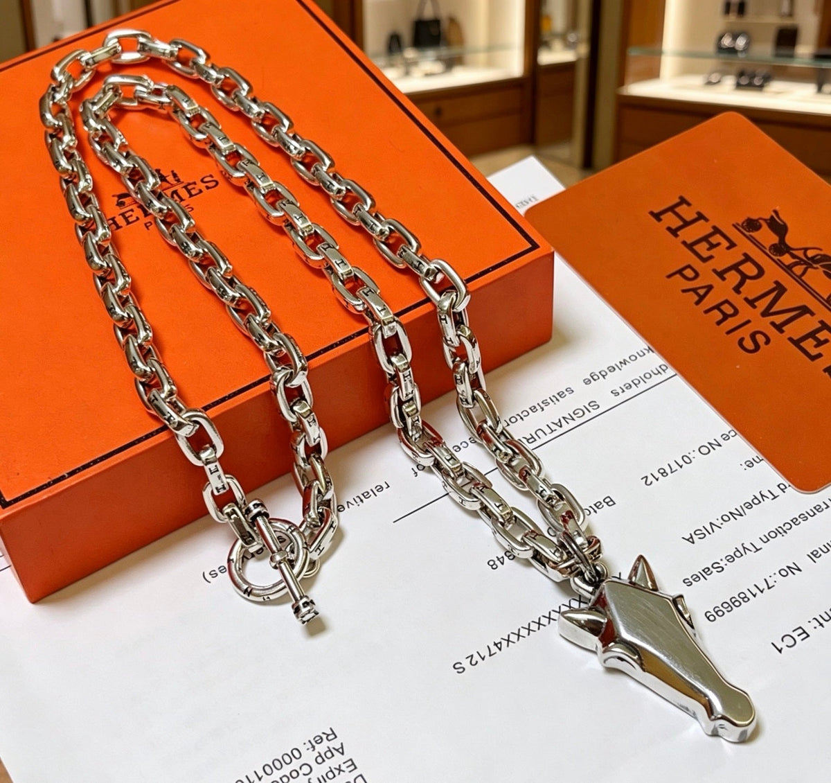 Martin Graham pendant necklace in polished metal-tone – side detail