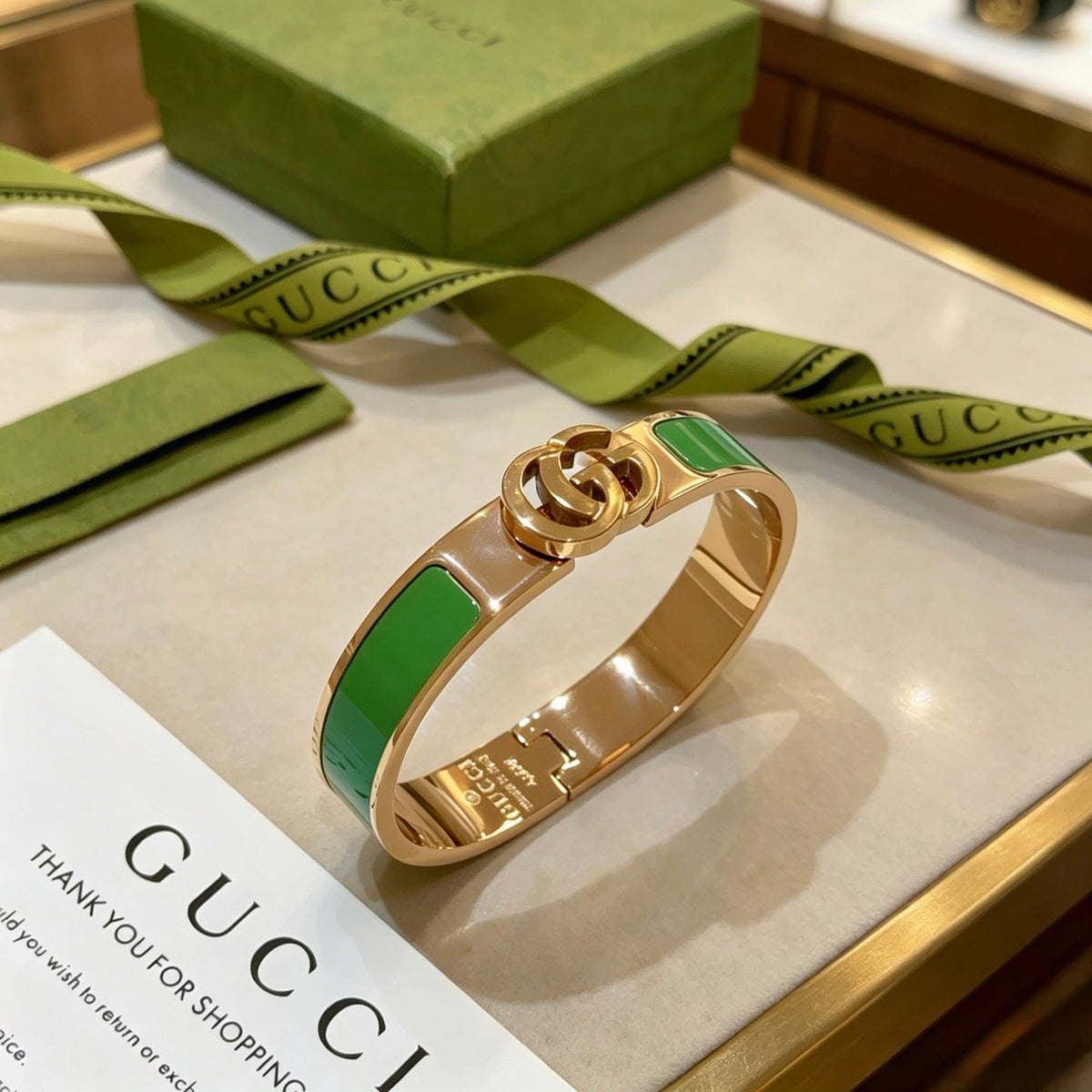 Martin Graham bangle in polished metal-tone – close-up detail
