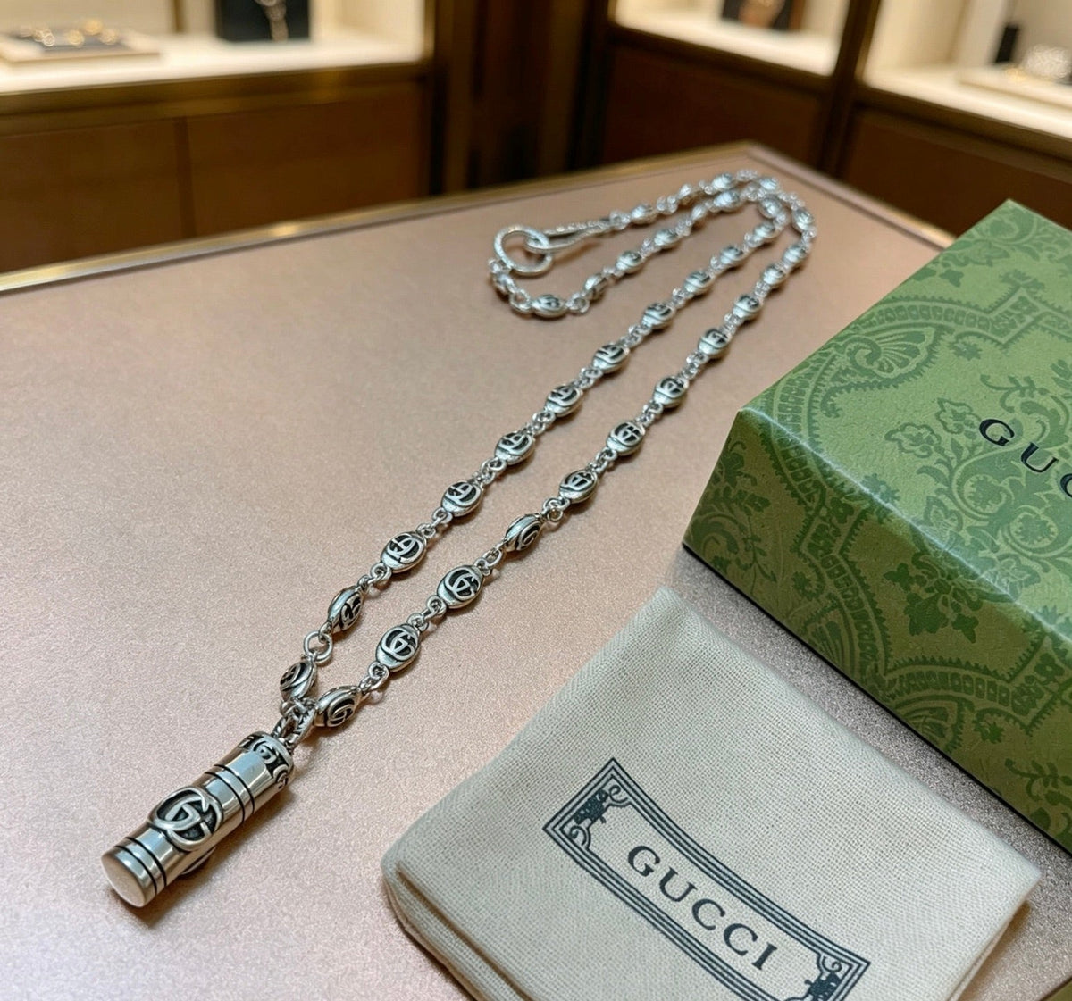 Martin Graham pendant necklace in polished metal-tone – front product view