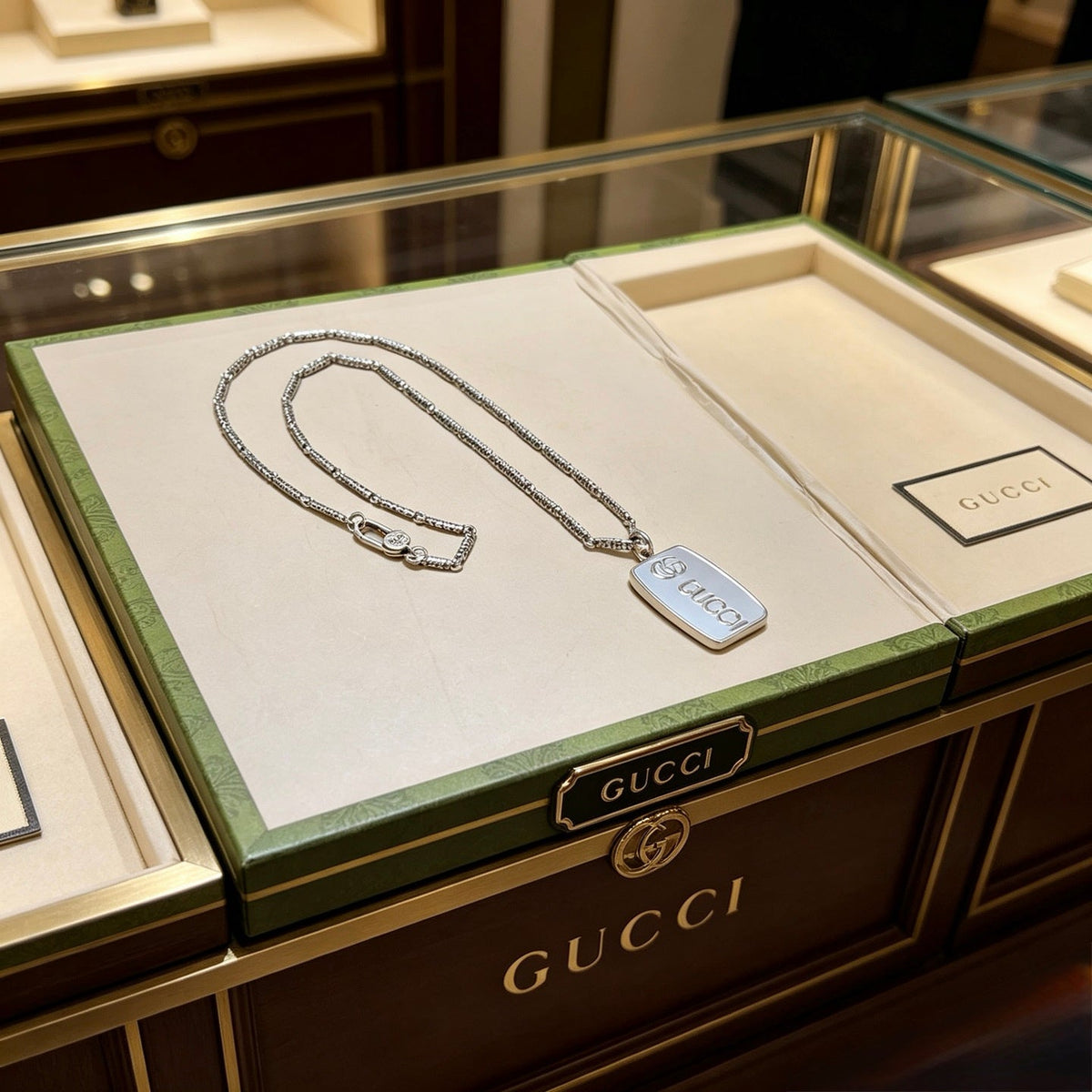 Martin Graham pendant necklace in polished metal-tone – styled product view