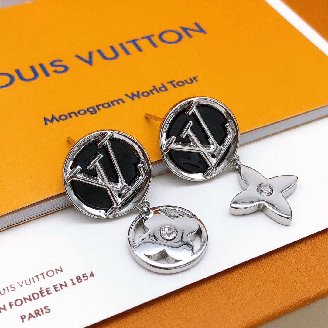 Martin Graham stud earrings in polished metal-tone – front product view